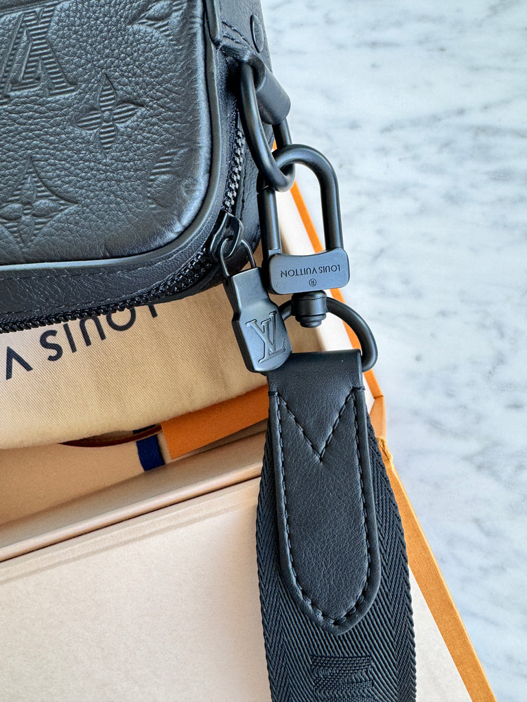 LOUIS VUITTON Monogram Empreinte Leather Messenger Bag