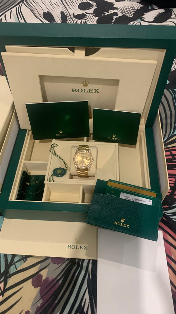 Rolex oyster perpetual day-date 36 yellow gold diamond watch 118388