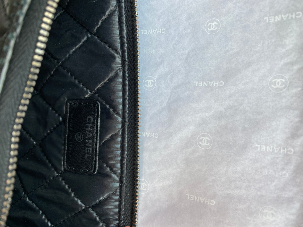 CHANEL Classic Pouch in Perforated Lambskin